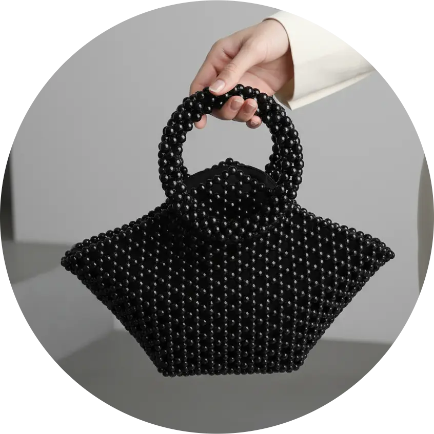 Handcrafted beaded top handle bag with crystals