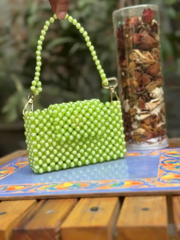 Handcrafted lime beaded handbag with detachable strap